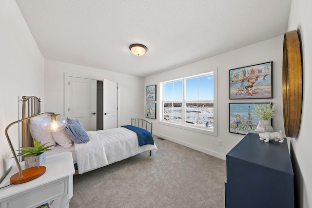 4181 Arbor Dr, Woodbury, MN 55129 - bedroom featuring carpet flooring, baseboards, a closet, and visible vents