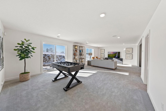 4181 Arbor Dr, Woodbury, MN 55129 - recreation room with recessed lighting, baseboards, and carpet floors