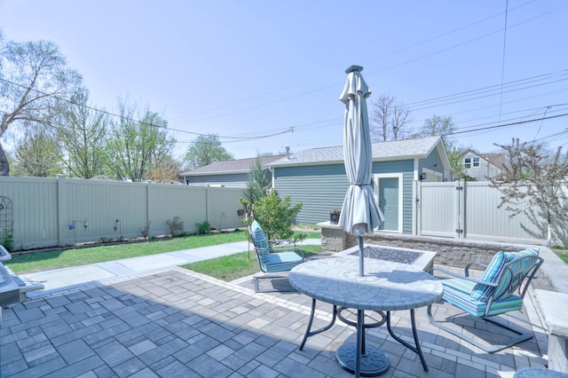 view of patio featuring a gate and a fenced backyard