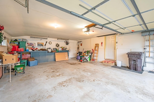 garage featuring a garage door opener