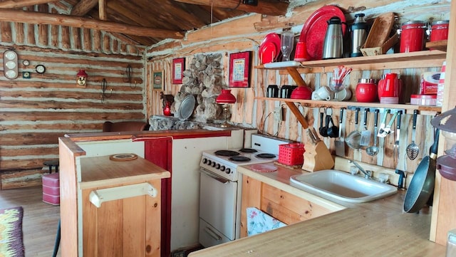kitchen featuring a sink, electric stove, wood finished floors, beamed ceiling, and log walls