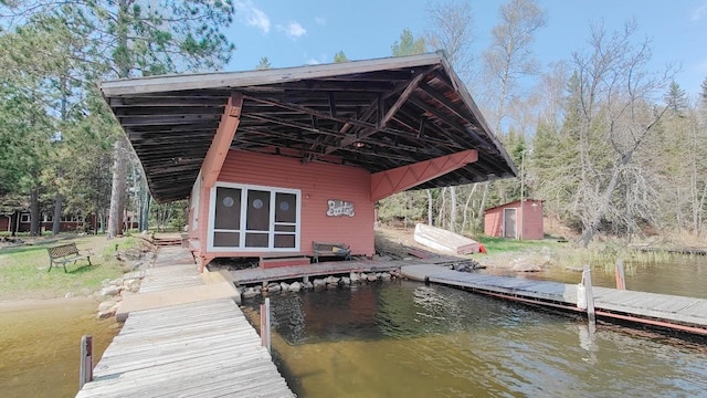 dock area with a water view