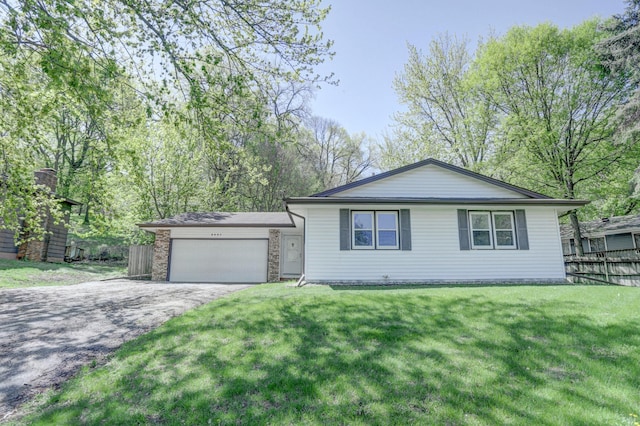 2401 Brookview Dr, Burnsville, MN 55337 - view of front facade featuring asphalt driveway and an attached garage