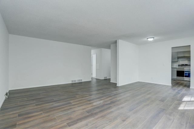2401 Brookview Dr, Burnsville, MN 55337 - unfurnished living room featuring dark wood finished floors, baseboards, and a textured ceiling