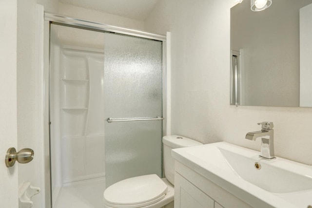 2401 Brookview Dr, Burnsville, MN 55337 - full bathroom featuring a stall shower, toilet, and vanity