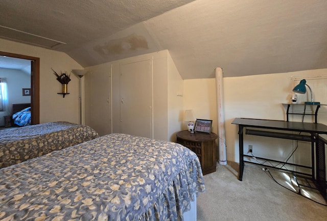 bedroom with lofted ceiling, light carpet, and a textured ceiling
