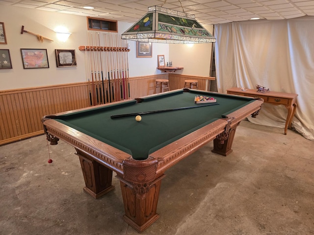 rec room with a paneled ceiling, billiards, and a wainscoted wall