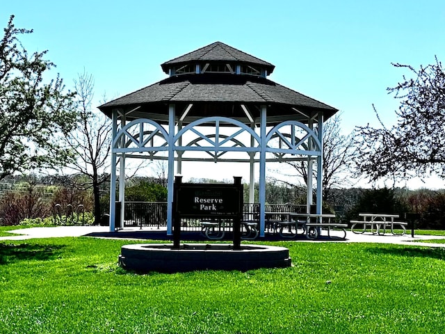 surrounding community featuring a lawn and a gazebo