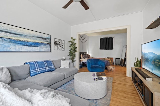 1204 Harmon Pl Unit 18, Minneapolis, MN 55403 - living area with light wood-style floors and ceiling fan
