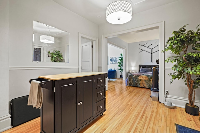 1204 Harmon Pl Unit 18, Minneapolis, MN 55403 - bathroom featuring hardwood / wood-style flooring and baseboards