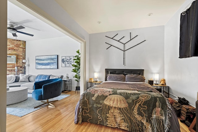 1204 Harmon Pl Unit 18, Minneapolis, MN 55403 - bedroom featuring wood finished floors and a wall mounted AC