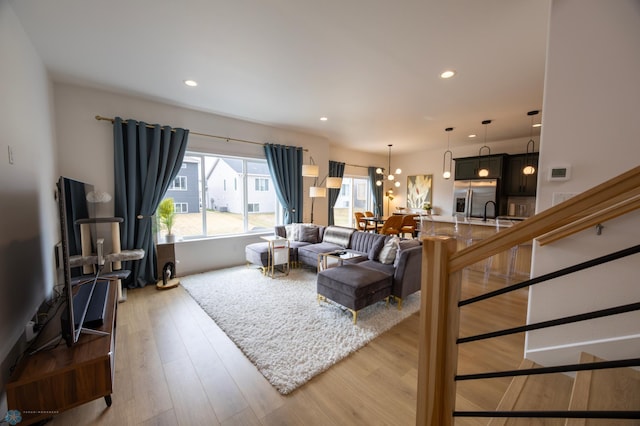 4964 Big Goose Ln S, Fargo, ND 58104 - living area featuring light wood-style flooring and recessed lighting