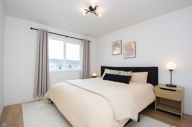 4964 Big Goose Ln S, Fargo, ND 58104 - bedroom featuring light wood-type flooring and baseboards