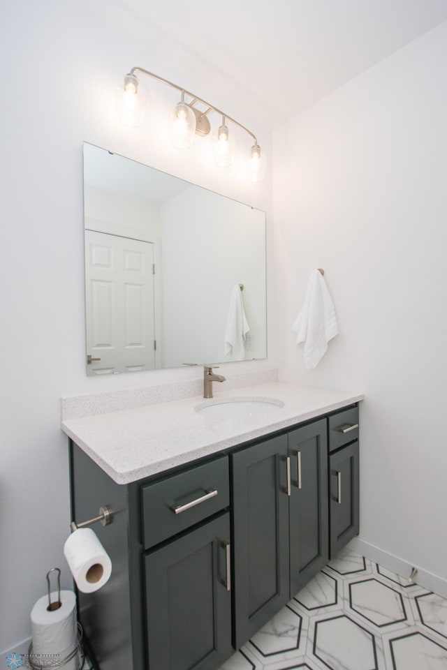 4964 Big Goose Ln S, Fargo, ND 58104 - bathroom featuring vanity and baseboards