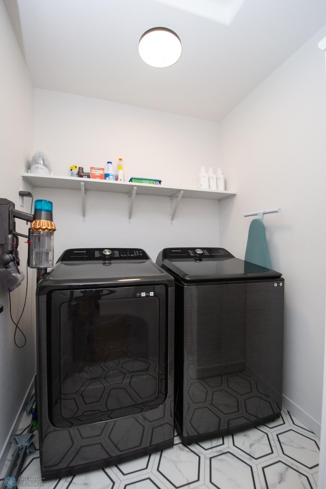 4964 Big Goose Ln S, Fargo, ND 58104 - washroom with washer and clothes dryer and baseboards