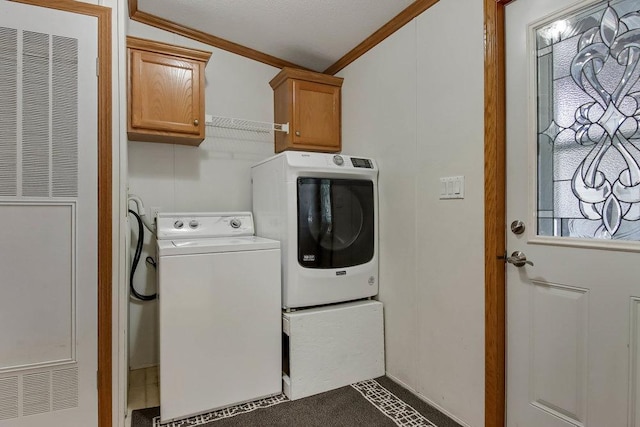 laundry area with cabinet space, washer and dryer, a heating unit, baseboards, and ornamental molding