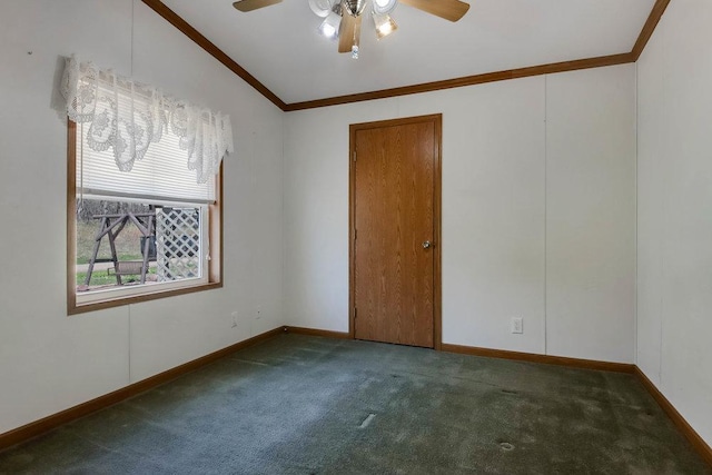 carpeted spare room featuring crown molding, ceiling fan, and baseboards
