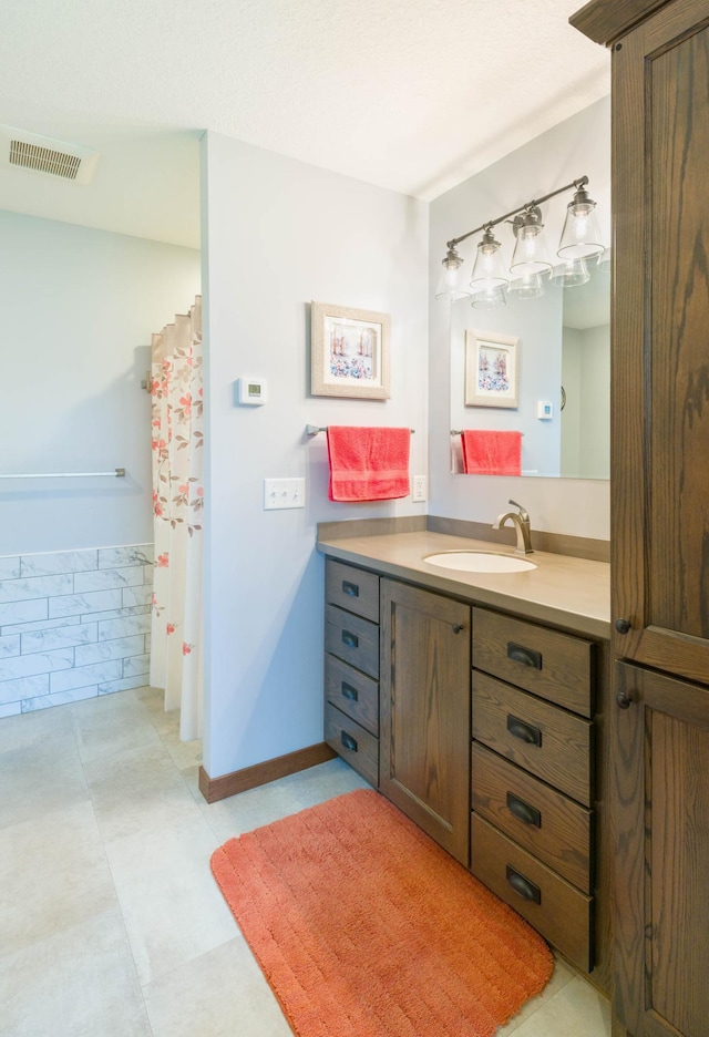 full bath with vanity and a shower with curtain