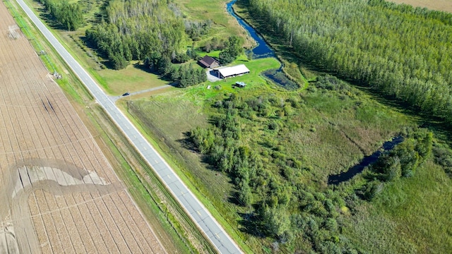 birds eye view of property featuring a rural view