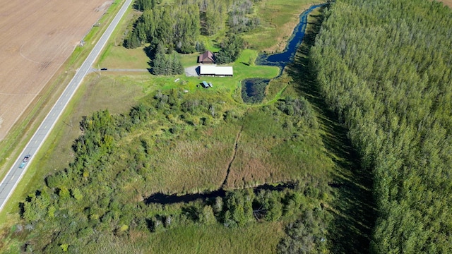 birds eye view of property featuring a rural view