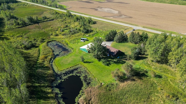 drone / aerial view featuring a rural view and a water view