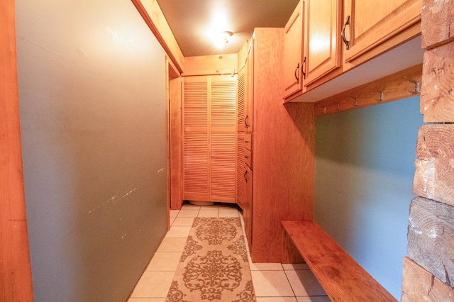 interior space featuring light tile patterned flooring