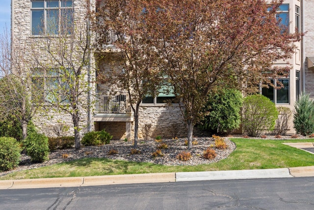 view of front of home featuring stone siding