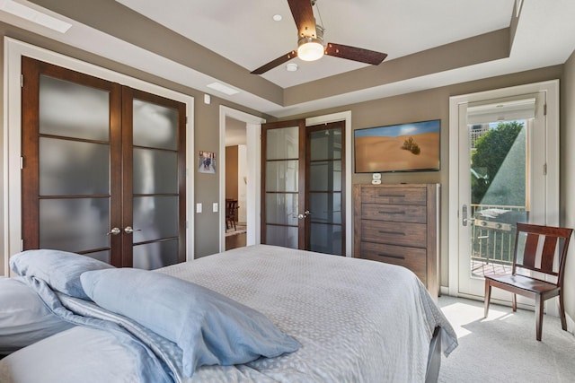 bedroom with french doors, ceiling fan, access to outside, and light colored carpet