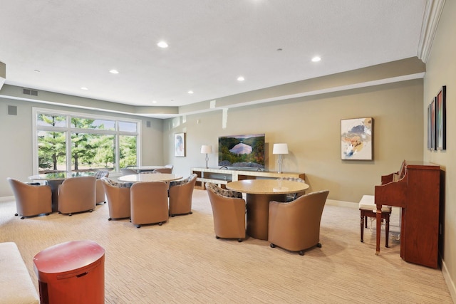 living room with recessed lighting, baseboards, visible vents, and light carpet