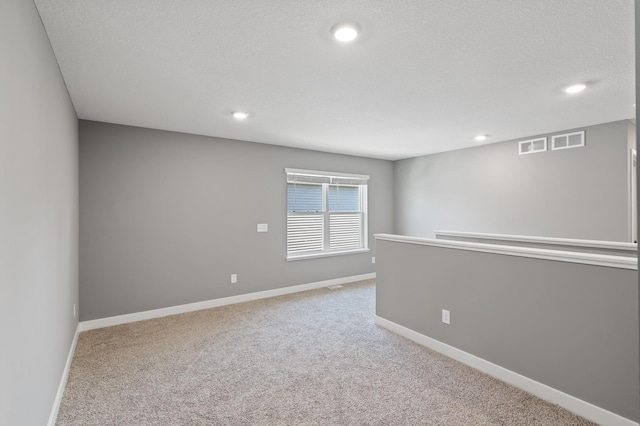 11263 131st Cir N, Dayton, MN 55327 - spare room featuring recessed lighting, carpet, and baseboards