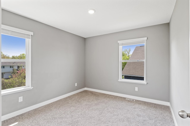 11263 131st Cir N, Dayton, MN 55327 - carpeted spare room featuring baseboards