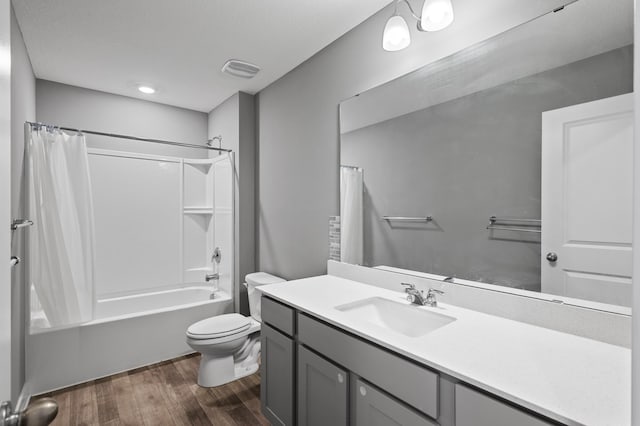 11263 131st Cir N, Dayton, MN 55327 - full bathroom with wood finished floors, toilet, vanity, and shower / bath combo with shower curtain