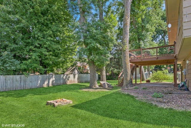 17150 Grenadier Ave, Lakeville, MN 55044 - fenced yard featuring stairway, a deck, and an outdoor fire pit