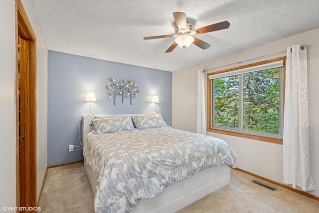 17150 Grenadier Ave, Lakeville, MN 55044 - bedroom with carpet floors, a textured ceiling, and ceiling fan