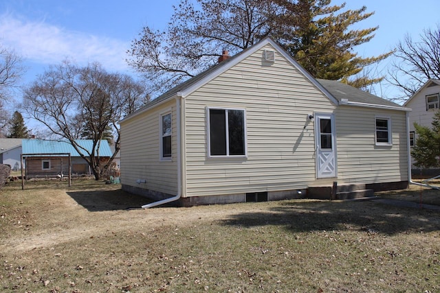 712 Kendall Ave S, Thief River Falls, MN 56701 - back of house featuring crawl space