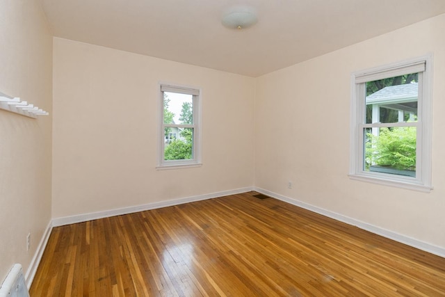 1677 Niles Ave, Saint Paul, MN 55116 - spare room with hardwood / wood-style floors and baseboards