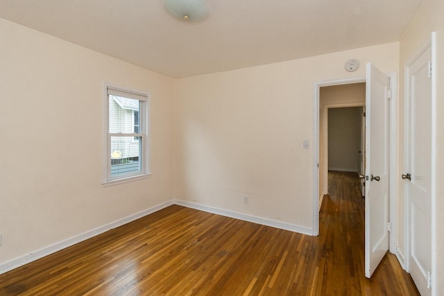 1677 Niles Ave, Saint Paul, MN 55116 - spare room featuring wood-type flooring and a smoke detector