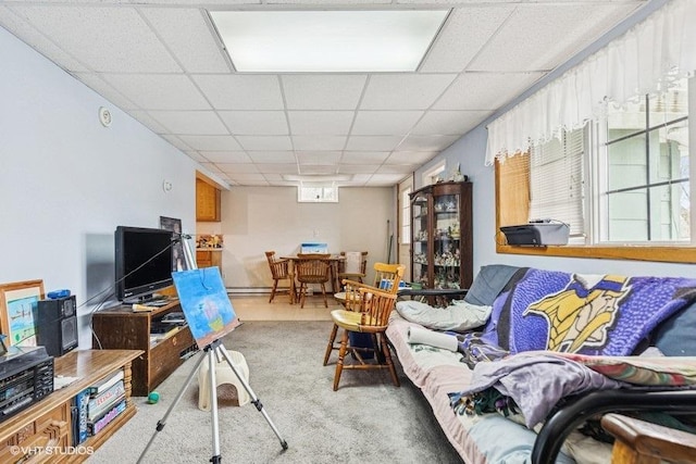 904 Washington St, Saint Croix Falls, WI 54024 - carpeted living room featuring a paneled ceiling
