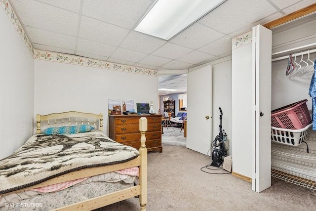904 Washington St, Saint Croix Falls, WI 54024 - carpeted bedroom featuring a drop ceiling