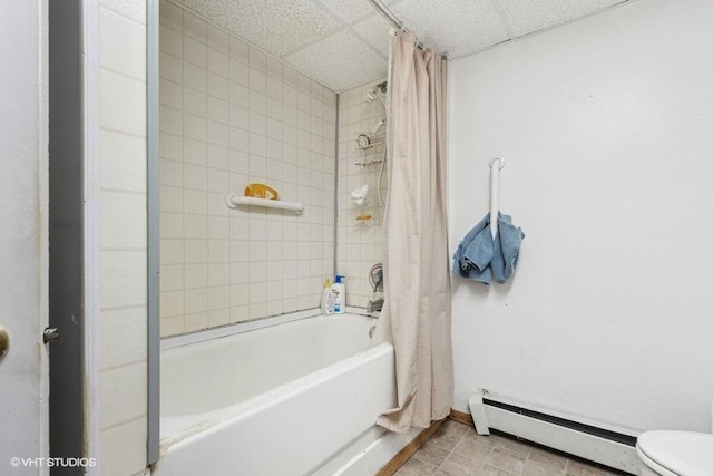 904 Washington St, Saint Croix Falls, WI 54024 - bathroom with toilet, a baseboard heating unit, a paneled ceiling, and shower / tub combo