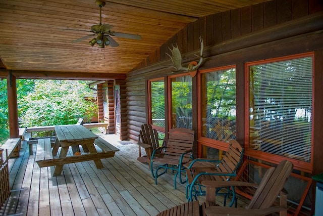 exterior space featuring a ceiling fan