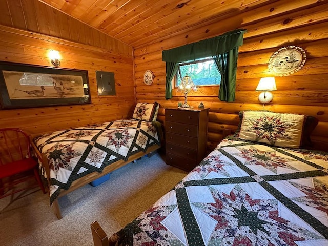 carpeted bedroom featuring lofted ceiling and wooden ceiling