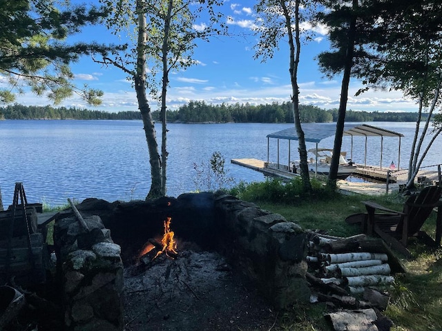 dock area with a water view