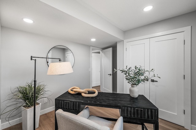 office with wood finished floors, baseboards, and recessed lighting