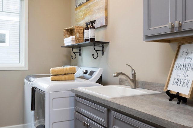 14897 144th Ave N, Dayton, MN 55327 - laundry area featuring cabinet space and independent washer and dryer
