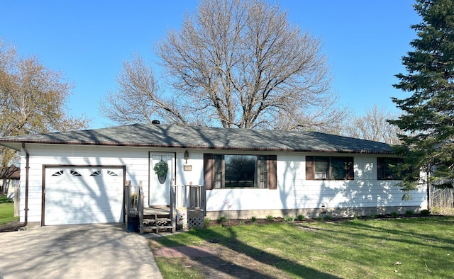 ranch-style home featuring a front lawn and a garage