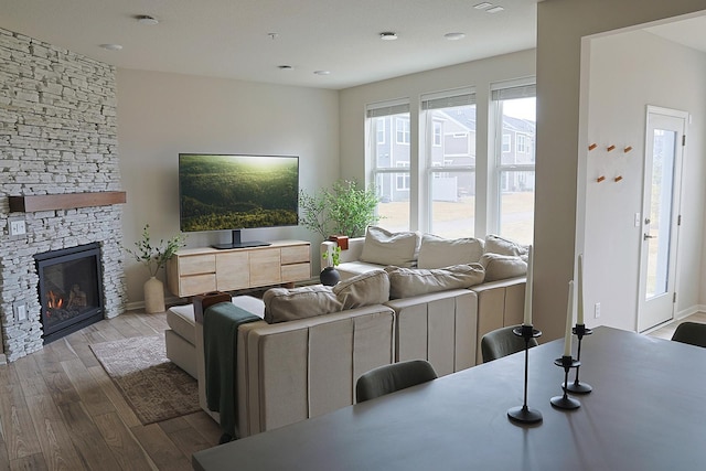 5275 94th Ln N, Brooklyn Park, MN 55443 - living room with wood finished floors, a fireplace, and recessed lighting