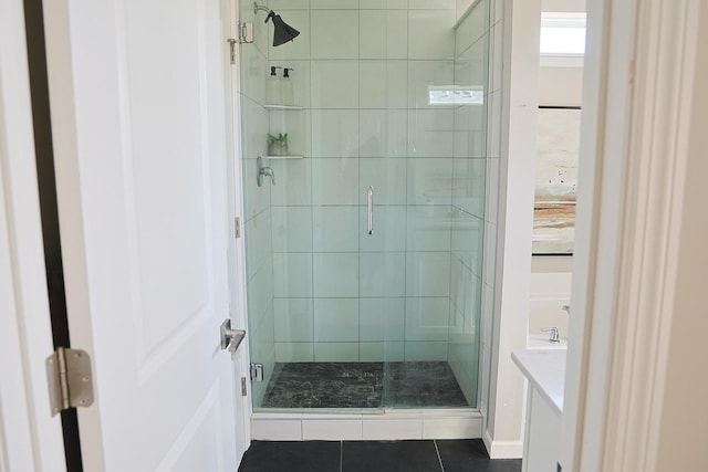5275 94th Ln N, Brooklyn Park, MN 55443 - bathroom with a stall shower and tile patterned floors