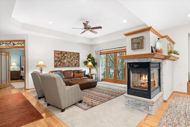 2222 White Oak Ct, Hudson, WI 54016 - living room with a fireplace, light wood finished floors, a ceiling fan, and recessed lighting
