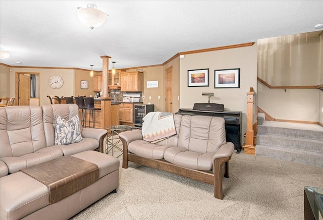 2222 White Oak Ct, Hudson, WI 54016 - living room with light carpet, ornamental molding, beverage cooler, and stairs